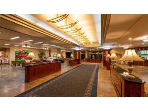 a lobby of a hotel with a waiting area at Hotel Symphony - Vacation STAY 85394v in Sagae