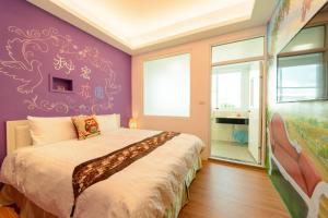 Postelja oz. postelje v sobi nastanitve Love in Hengchun B&B