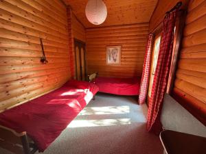 Ένα ή περισσότερα κρεβάτια σε δωμάτιο στο Chalet la Lezardiere