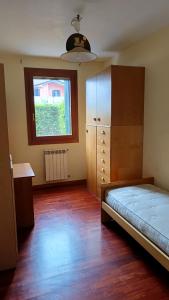 Postel nebo postele na pokoji v ubytování Appartamento Primavera