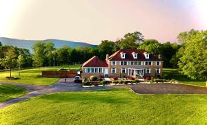 a large house with a large yard at Carpathia West Estate in West Milford