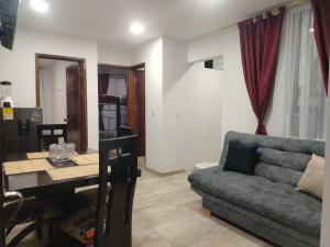 Posezení v ubytování Apto turístico a 5mn de la Basílica - Chiquinquirá + 3 fotografie