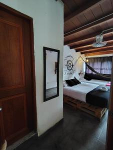 Postel nebo postele na pokoji v ubytování SUITE CONFORT 1 a 4 Personas + 2 fotografie