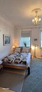 Ένα ή περισσότερα κρεβάτια σε δωμάτιο στο Schoenes helles Zimmer mit Bad, Nähe Bilk, Nähe Uni