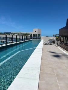 Πισίνα στο ή κοντά στο Flat LUXO PORTO DE GALINHAS CENTRINHO 211 SEASON
