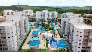 an aerial view of an apartment complex with a pool at Lagoa Quente Flat in Caldas Novas