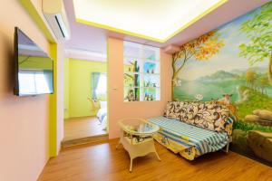 TV in/ali zabaviščno središče v nastanitvi Love in Hengchun B&B