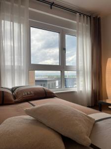 Кровать или кровати в номере Apartman Fantasia