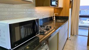 Køkken eller tekøkken på Apartamentos de Temporada Casa Carmel