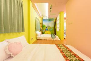 Postelja oz. postelje v sobi nastanitve Love in Hengchun B&B