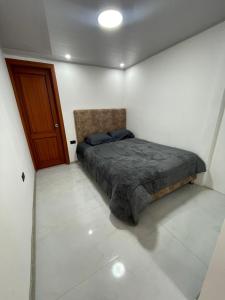 Postel nebo postele na pokoji v ubytování Suite