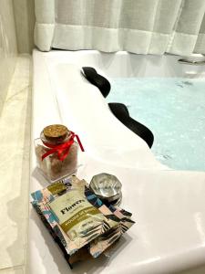 a table with a tray of food next to a swimming pool at Chalés Montana in Domingos Martins +13 photos