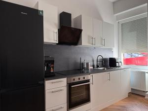 Кухня або міні-кухня у Offenbach 200m2 12 Personen O1 +13 фото