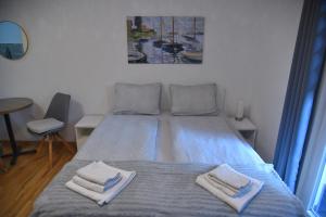 Krevet ili kreveti u jedinici u okviru objekta Dekart Apartment