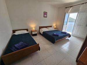 Katil atau katil-katil dalam bilik di Apartment Savar 8079c