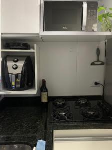 Kuchyň nebo kuchyňský kout v ubytování Miniapartamento xaxim 2