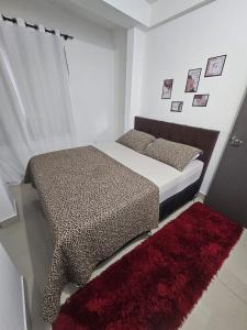 Una cama o camas en una habitación de Aconchego