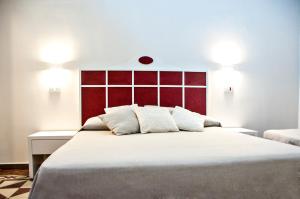 Posteľ alebo postele v izbe v ubytovaní B&B Ghalà