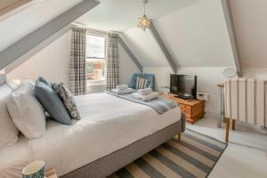 Voodi või voodid majutusasutuse Harbour View House toas