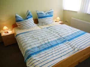 Ένα ή περισσότερα κρεβάτια σε δωμάτιο στο Holiday apartment with 2 bedrooms