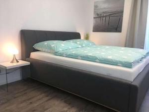 Katil atau katil-katil dalam bilik di Holiday apartment STRELASUNDBLICK