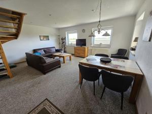 Μια τηλεόραση ή/και κέντρο ψυχαγωγίας στο Osterdeich Apartment 5
