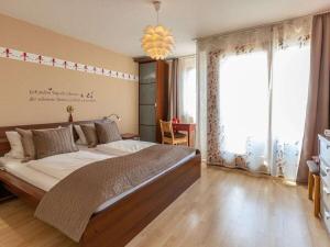 Un ou plusieurs lits dans un hébergement de l'établissement 1-bedroom holiday apartment