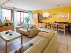 Coin salon dans l'établissement 1-bedroom holiday apartment