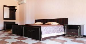 Posteľ alebo postele v izbe v ubytovaní Dergachov Guest House