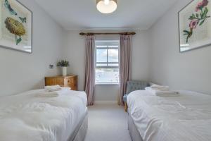 Postel nebo postele na pokoji v ubytování Seacroft