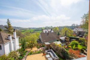 an aerial view of a house with a garden at Honey Cottage in Richmond +5 photos