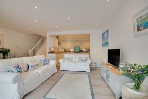 Televiisor ja/või meelelahutuskeskus majutusasutuses Urchins Peak