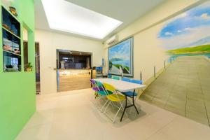 Love in Hengchun B&B tesisinde bir televizyon ve/veya eğlence merkezi