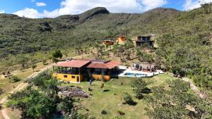 an aerial view of a house on a mountain at Refúgio Tangará in Rio Acima