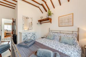 Voodi või voodid majutusasutuse Gazen View Cottage toas