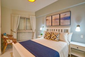 Ένα ή περισσότερα κρεβάτια σε δωμάτιο στο Caribbean Beachfront Apartment. W/ Scenic view +53 φωτογραφίες