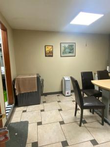a waiting room with a chair and a heater at Mini Supercentrico in Lima