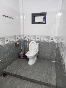 Koupelna v ubytování Dong Suoi H'mong Homestay & Bungalow + 122 fotografií