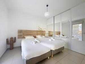 Postel nebo postele na pokoji v ubytování T2 Evasion Azur-4p 150m from t/sea, terrace, park.