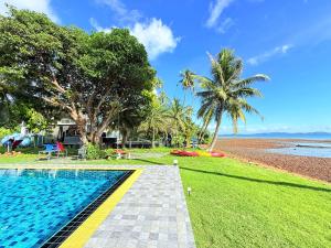 a resort with a swimming pool next to the beach at Pool Villa Viewthalay in Ko Chang