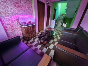 an overhead view of a living room with a fish tank at Room in Kapan, Near Boudhanath Stupa in Kathmandu