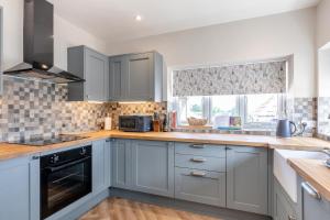 Foto sihtkohas Curland asuva majutusasutuse The Milking Parlour - Heavenly Views Cot galeriist