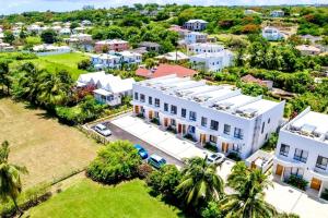 an aerial view of a large white building at ZenBreak Azzurro 9, 2bd in Saint James