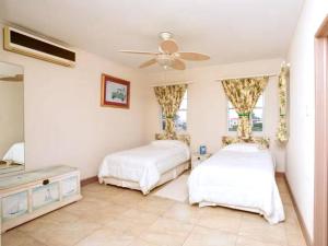 Ένα ή περισσότερα κρεβάτια σε δωμάτιο στο Landsdown House 5bd by ZenBreak