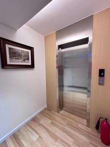 a walk in shower in a room at The Charm Boutique Hotel in Hue in Cồn Giả Viên +31 photos