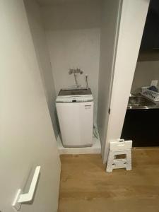 a small bathroom with a sink in a room at Rusutsu Golf&Ski Lodge - Vacation STAY 18169 in Rusutsu