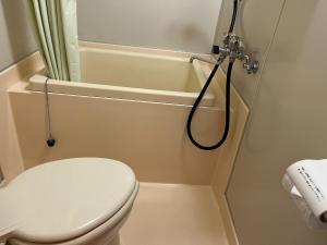 a bathroom with a toilet and a shower at Maison Loire - Vacation STAY 18226 in Hakodate