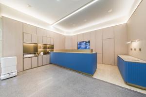 Η κουζίνα ή μικρή κουζίνα στο Hanting Hotel Beijing Shangdi Center +1 φωτογραφίες