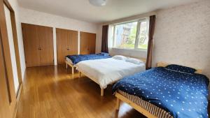 Postel nebo postele na pokoji v ubytování SECOND HOUSE OTARU - Vacation STAY 03565v