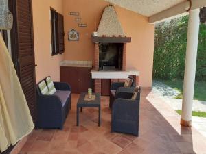 a living room with a fireplace in a house at Charming Pool Home Near Pula in Pula